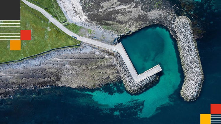 An aerial photo of a walled pier.