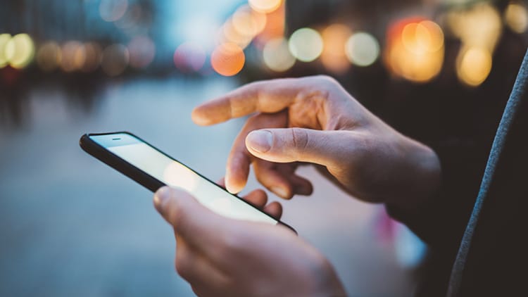 A person using a mobile device.