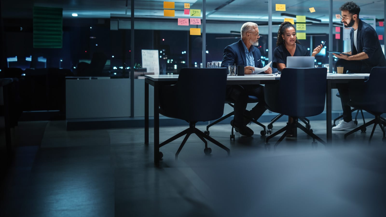 A team discussing a project in a meeting room.