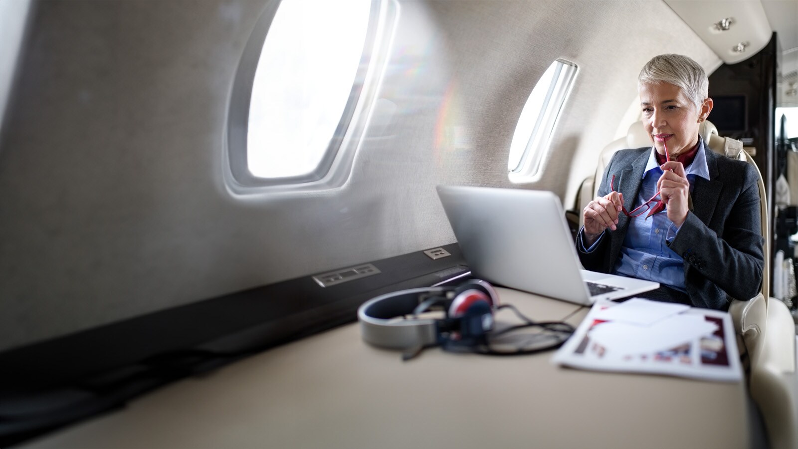 Business woman on a plane