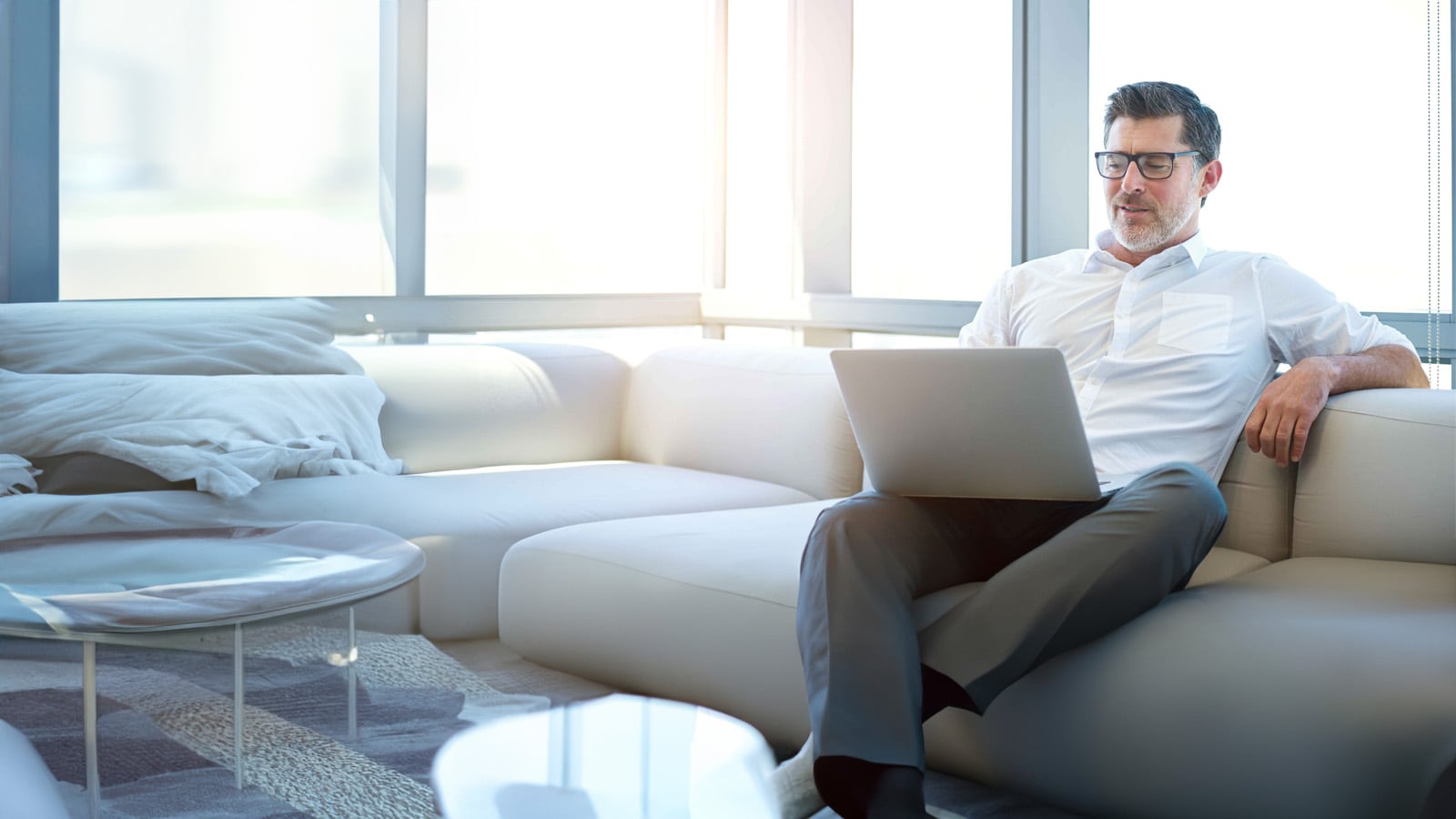 A man using a laptop.