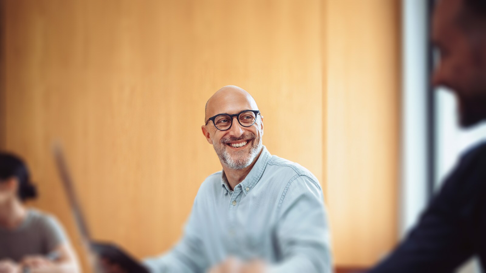 Two men looking at laptop