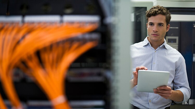 A person checking a  server