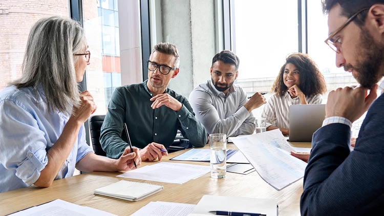 People sitting around a work table