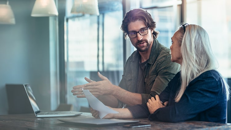 Two Colleagues discussing Consumer Protection Code changes