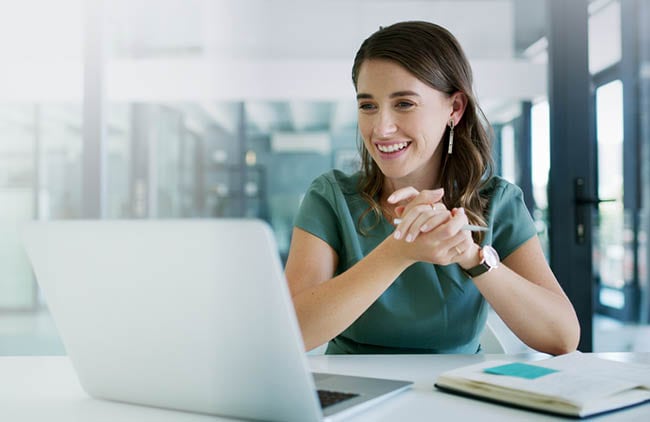 woman looking at a laptop